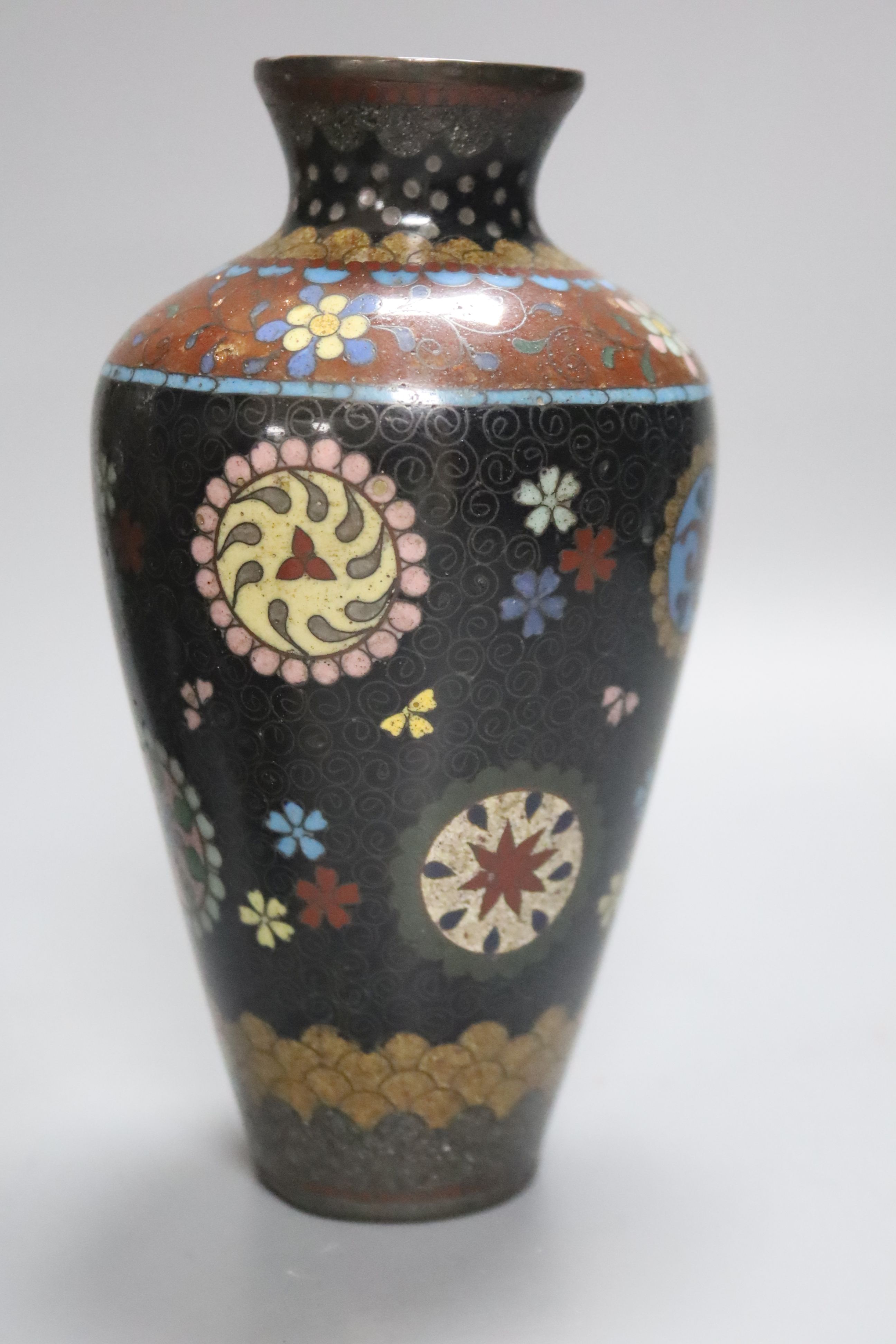 Four Japanese cloisonne vases, together with a similar jar and cover, height 19cm